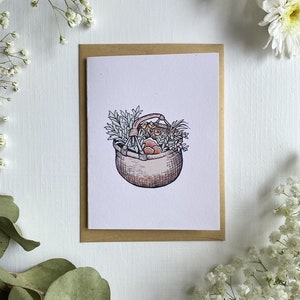 Cesto di erbe aromatiche in carta bianca