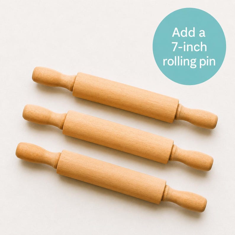 May include: Three light brown wooden rolling pins arranged horizontally. Each rolling pin features a central cylindrical barrel with two rounded handles on either side. A teal circular graphic in the upper right corner contains the text Add a 7-inch rolling pin.
