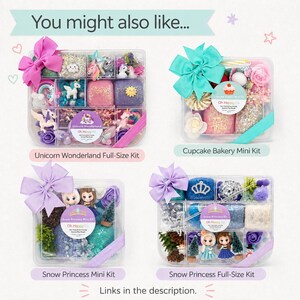 May include: Four clear plastic sensory kits labeled Unicorn Wonderland, Cupcake Bakery, and Snow Princess. Each kit contains colorful dough, miniature figurines, and decorative items, topped with a large fabric bow and branded circular stickers.