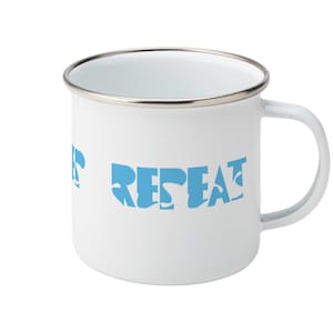 May include: A white enamel mug with a silver-toned rim and a side handle. The mug features the word REPEAT printed in a light blue, stylized, bold font across the front surface. The design is clean, simple, and functional in its construction.