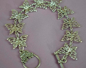 Pulsera de mariposa, Silvertone, diez mariposas, ocho pulgadas de largo, alternar cierre