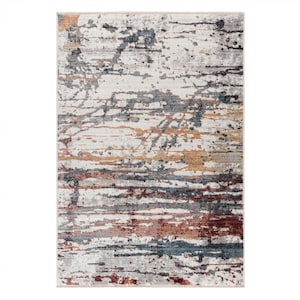May include: Rectangular area rug with an abstract design. The rug features a white background with streaks of gray, brown, orange, and blue. The design has a distressed, textured appearance, suitable for a living room or bedroom.