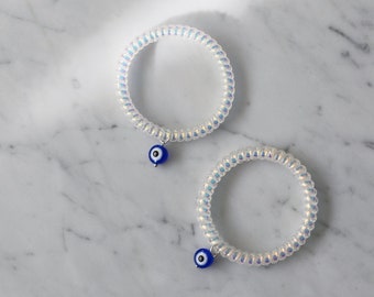 Evil eye hair-tie bracelets | Aurora coil bracelets | Evil eye ponytail holder | Blue evil eye spiral hair ties | Women hair accessories