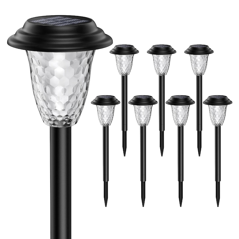 Full 10-pack set of black solar stake lights with clear petal-pattern lampshades on a white background