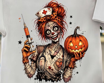 May include: A white t-shirt featuring a graphic of a nurse with red hair, stitched skin, and a clown nose. The nurse wears a nurse cap and uniform, holds a syringe in one orange-gloved hand, and carries a glowing jack-o'-lantern in the other.