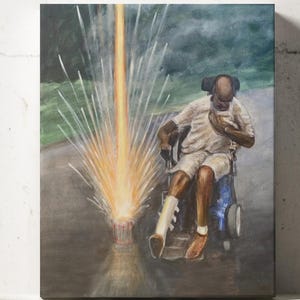 May include: A painting on canvas depicts a person in a wheelchair with a leg cast, illuminated by a beam of light. The artwork features a person in a white shirt and shorts, set against a backdrop of a road and trees. The painting is displayed on a white shelf.