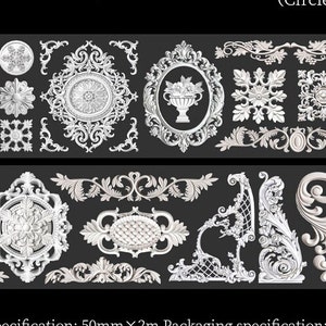 May include: A set of 24 white ornate decorative mouldings with intricate floral designs. The mouldings are arranged in two rows on a black background.