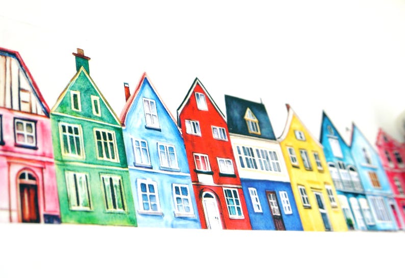 May include: Watercolor painting of a row of colorful houses. Each house features a unique color scheme, including pink, green, blue, red, yellow, and teal. The houses have white window frames and varying roof designs.