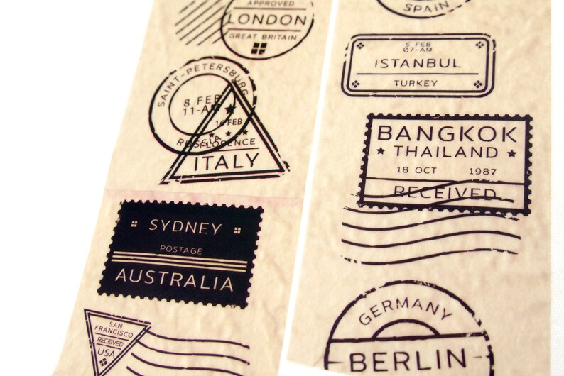 May include: A collection of vintage-style postage stamps with black ink on a beige paper background. The stamps feature city names and dates, including London, Istanbul, Bangkok, Sydney, and Berlin.
