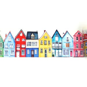 May include: A watercolor painting of a row of colorful houses. The houses are painted in various colors, including red, blue, yellow, and green. Each house has unique architectural details, such as windows, doors, and gabled roofs. The artwork is set against a white background.