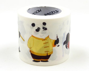 May include: A roll of white washi tape featuring a panda bear wearing a yellow and orange Chinese-style jacket. The panda is holding a paintbrush and there are other black and white panda bears in the background. The tape is labelled "MOODTAPE".