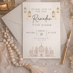 May include: An invitation for a Ramadan Iftar dinner. The card features the text "PLEASE JOIN US FOR OUR Ramadan IFTAR DINNER" with the date February 21 at 8:34. The design includes hanging lanterns and a mosque illustration, with a gold pen and prayer beads.