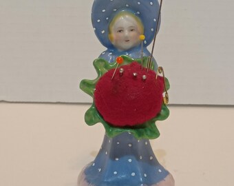 Vintage Porcelain Girl Pin Cushion Blue Dress & Bonnet Enamel Dots Made in Japan