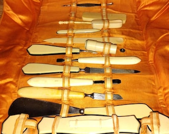 vintage manicure set in a fabric roll-up case 1920s complete