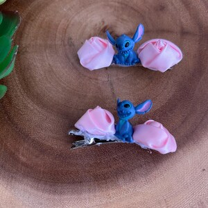 Pair of blue monster hairclip