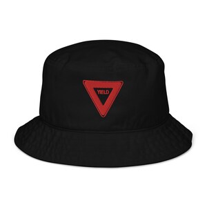 May include: Black bucket hat with a red yield sign embroidered on the front.