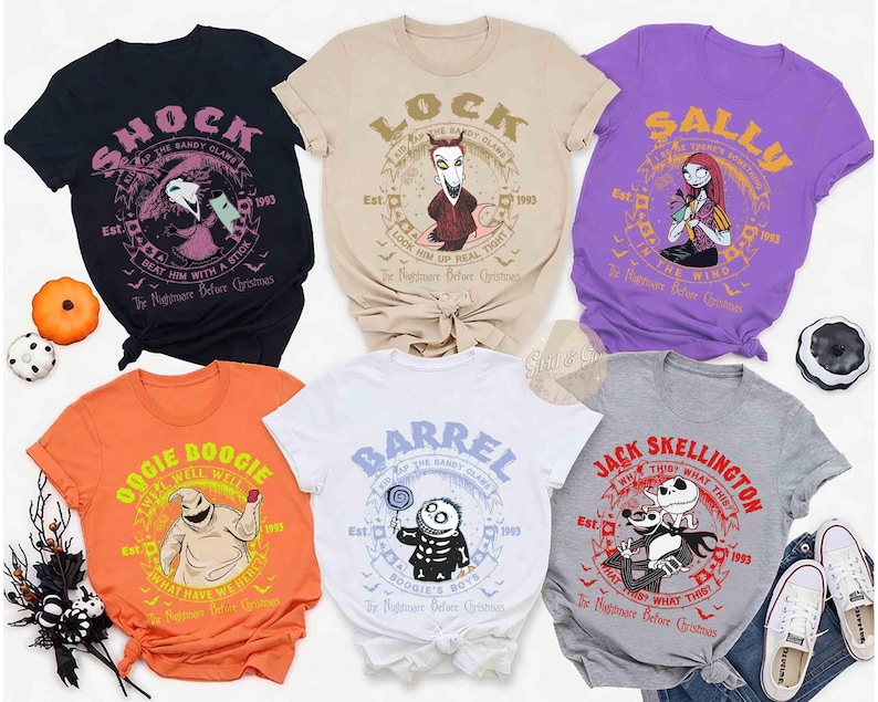 May include: Collection of six t-shirts featuring characters from "The Nightmare Before Christmas." Designs include "Shock," "Lock," "Sally," "Oogie Boogie," "Barrel," and "Jack Skellington." Each shirt has a unique graphic and text, with the year 1993.