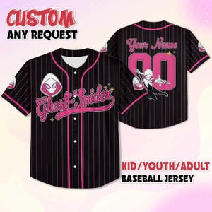 May include: Black baseball jersey with pink pinstripes and accents. Features the text "Ghost Spider" and a character graphic on the front. The back has space for a name and number, with a character graphic. Available in kid, youth, and adult sizes.
