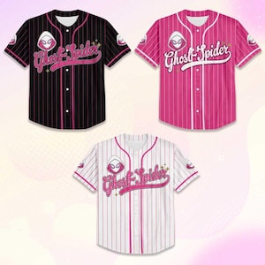 May include: Three baseball jerseys featuring the Ghost-Spider logo and text. One is black with pink pinstripes, another is pink with white pinstripes, and the third is white with pink pinstripes. Each jersey has short sleeves and a button-up front.