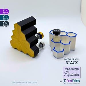 May include: Modular vial stacks in gold, black, and white, designed to hold vials. One stack has a stepped design, the other a honeycomb shape. The image includes text that says "Modular Vial Stack" and "Organized Peptides".
