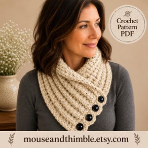 May include: A beige crochet cowl with a ribbed texture and four large black buttons along the diagonal edge. The image includes a circular badge with the text Crochet Pattern PDF and the website address mouseandthimble.etsy.com at the bottom.