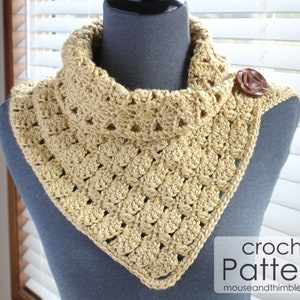 May include: A crocheted cowl in a light beige color with a brown button. The cowl is displayed on a mannequin. The text "crochet Pattern" is visible at the bottom of the image.