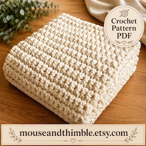 May include: A folded cream-colored crochet blanket with a textured stitch pattern. A circular badge in the upper right corner reads Crochet Pattern PDF. A rectangular label at the bottom displays the text mouseandthimble.etsy.com.