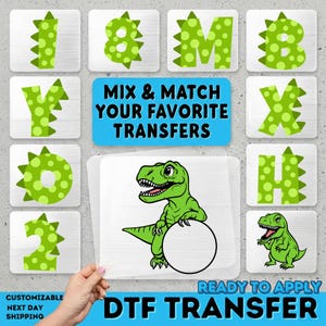 May include: A collection of green dinosaur-themed DTF transfers. The image includes letters and numbers with a dotted pattern, a cartoon dinosaur, and the text "MIX & MATCH YOUR FAVORITE TRANSFERS" and "READY TO APPLY DTF TRANSFER".