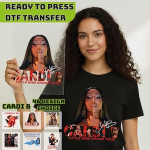 May include: A black t-shirt and a clear DTF transfer featuring a graphic of Cardi B with the text "LITTLE MISS DRAMA TOUR". The transfer is held by a person. Additional design choices are displayed below the transfer.