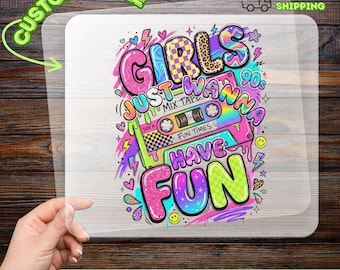 May include: A clear DTF transfer sheet featuring a colorful graphic design with the text Girls Just Wanna Have Fun, a cassette tape labeled Mix Tape Fun Times, and various patterns including leopard print, checkerboard, and neon lightning bolts.