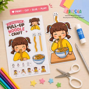 Puede incluir: Un kit de manualidades interactivo en 3D de fideos que incluye una hoja impresa con un personaje de dibujos animados comiendo ramen, una versión recortada del personaje, pegamento en barra, tijeras y lápices de colores. El texto dice 3D INTERACTIVE PULL-UP NOODLE CRAFT.