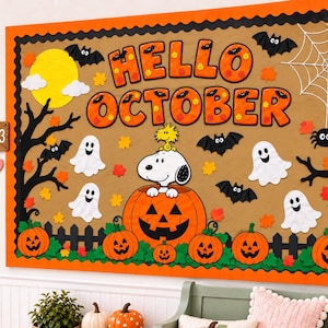 May include: A rectangular Halloween bulletin board display featuring the text HELLO OCTOBER in orange letters. The scene includes a Snoopy character in a jack-o'-lantern, white ghosts, black bats, a spider web, and various orange pumpkins.