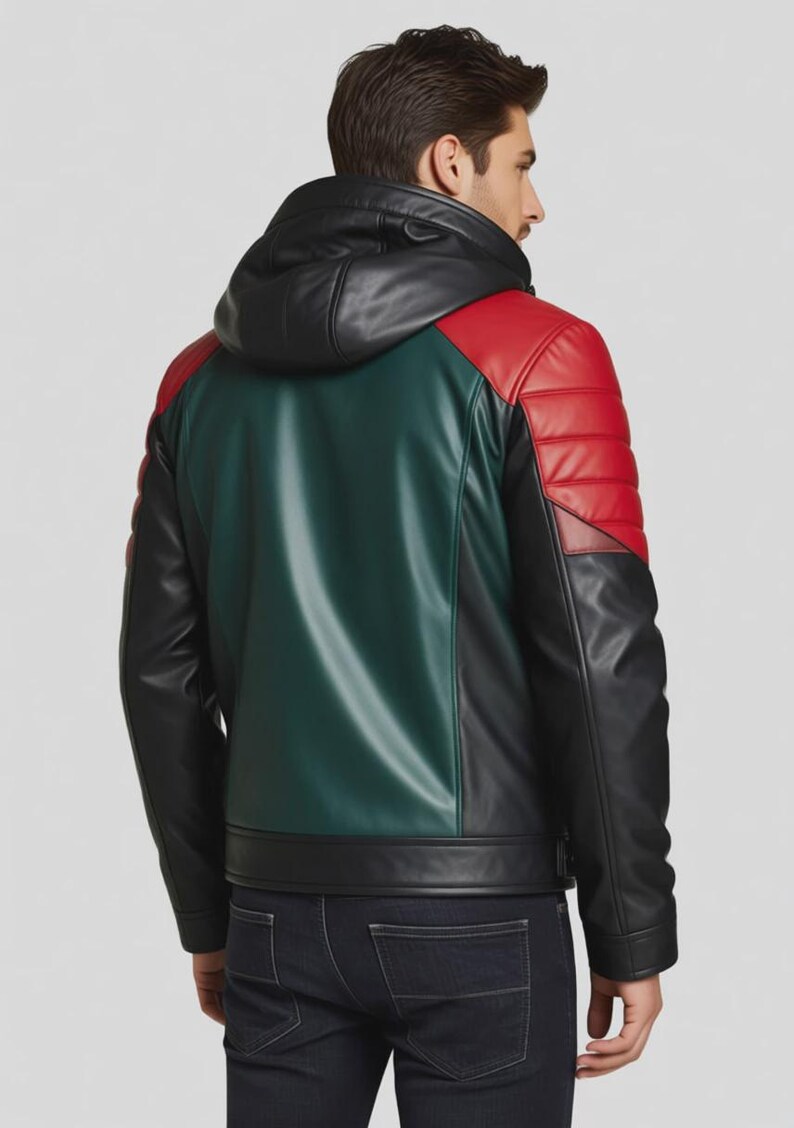 May include: A multi-coloured leather jacket with a black hood and a green back panel. The shoulders are red with quilted stitching. The jacket has a black front and sleeves. The model is wearing dark blue jeans.