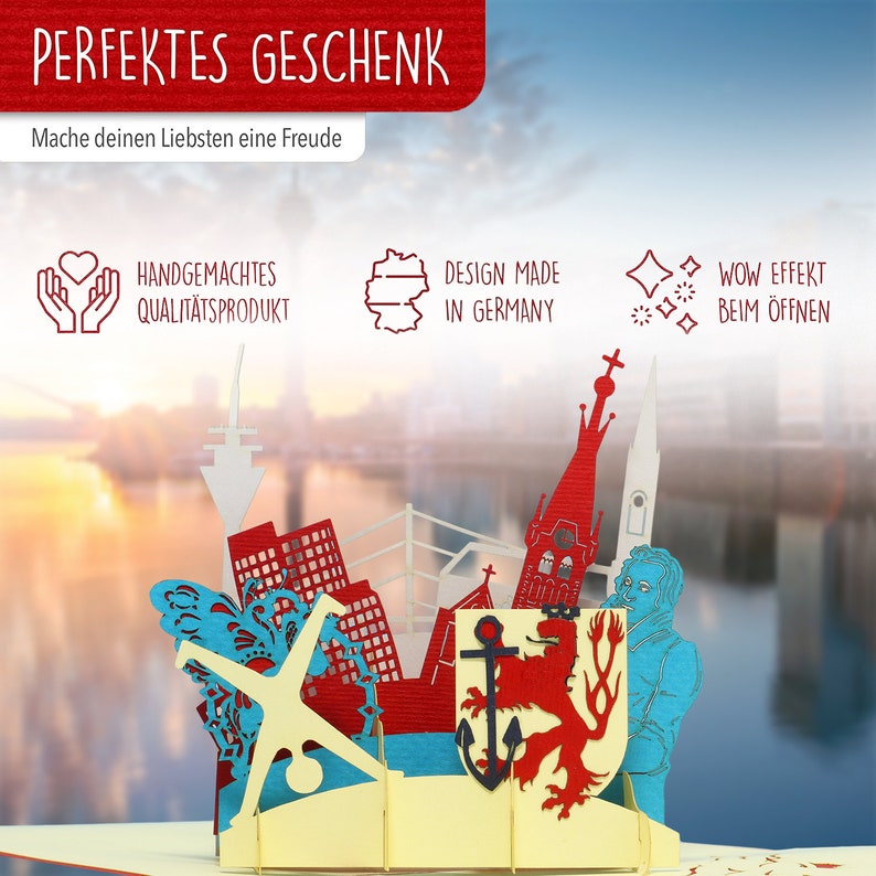 May include: A red, white, and blue 3D pop-up card depicting a cityscape with a red lion, an anchor, and a church steeple. The card is made in Germany and has a wow effect when opened.