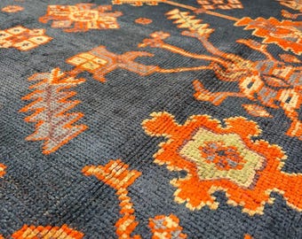 Hand knotted navy blue and orange tribal rug | traditional geometric pattern handmade wool area rug for living room bedroom