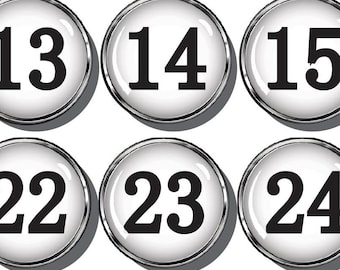 Big white numbers. Magnetic numbers for your calendar. Glass numbers