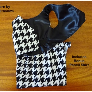 May include: A black and white houndstooth fabric vest and skirt set with a black satin lining. The vest has a ruffled neckline. The skirt is a pencil skirt. The text "Includes Bonus Pencil Skirt" is visible in the image.