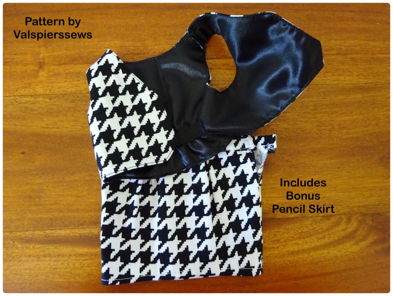 May include: A black and white houndstooth fabric vest and skirt set with a black satin lining. The vest has a ruffled neckline. The skirt is a pencil skirt. The text "Includes Bonus Pencil Skirt" is visible in the image.