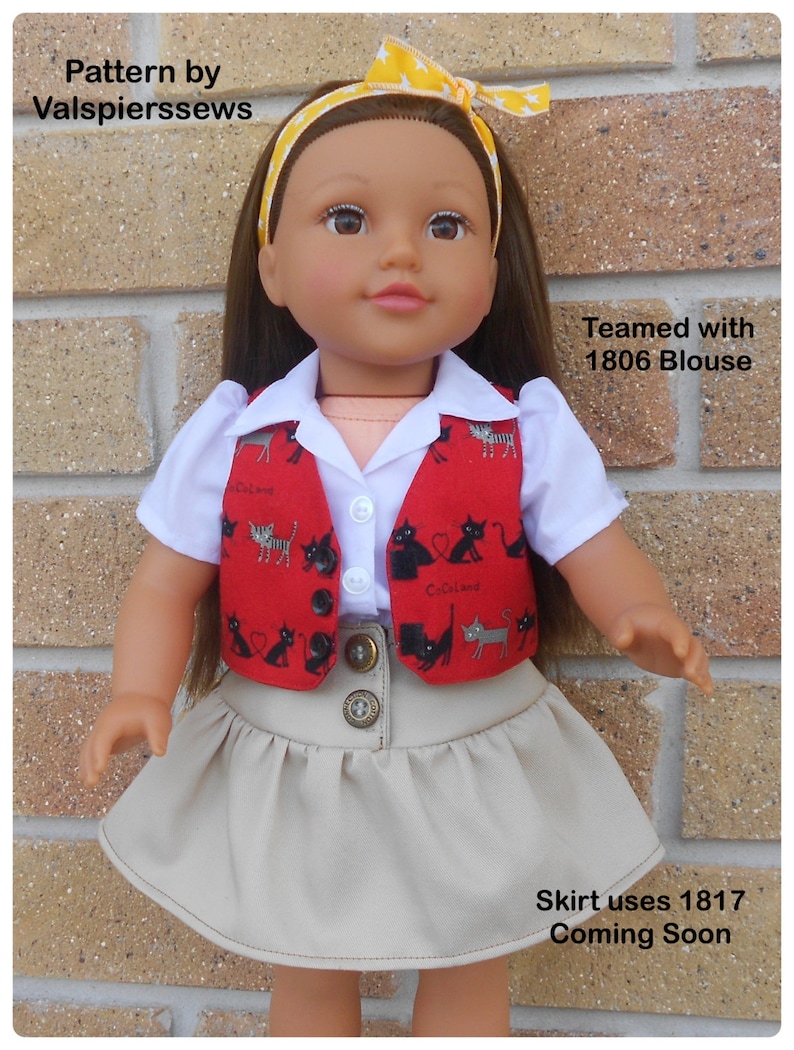 May include: A doll wearing a red vest with black cats printed on it, a white collared shirt, a beige skirt, and a yellow headband. The vest has the text "Cool Cats" on it. The text "Teamed with 1806 Blouse" and "Skirt uses 1817 Coming Soon" is also visible in the image.