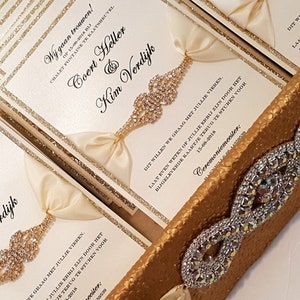 Luxury Ivory and Gold Glitter Wedding Invitation Suite with Statement Rhinestone Embellishment l Custom Ribbon | Bilingual l USA Made