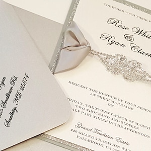 Luxury Silver Platinum Glitter Wedding Invitation Suite with Statement Rhinestone Embellishment l Custom Ribbon | Bilingual l USA Made