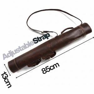 May include: A brown leather carrying case with an adjustable strap. The cylindrical case is 33.5 inches long and 5 inches in diameter. It has a handle and two small pockets. The text "Adjustable Strap" is visible.