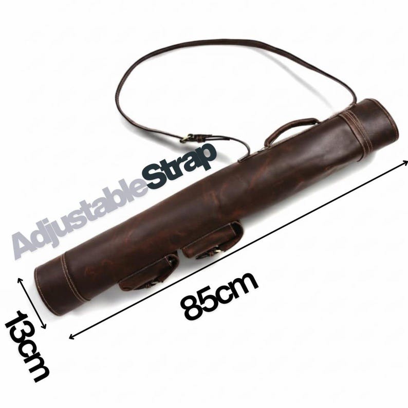 May include: A brown leather carrying case with an adjustable strap. The cylindrical case is 33.5 inches long and 5 inches in diameter. It has a handle and two small pockets. The text "Adjustable Strap" is visible.