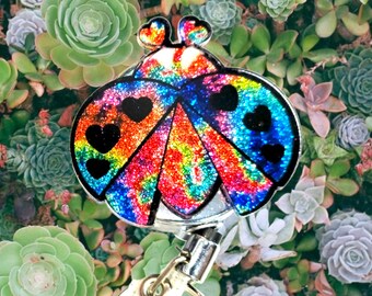 Ladybug badge reel lanyard. Rainbow Tie dye pattern. Glitter acrylic, uv resin. Nursing retractable reel. Teacher lanyards