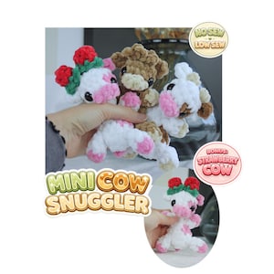 May include: Three small plush cow toys made of soft, chunky yarn. One is white with pink spots and a strawberry hat, one is brown, and one is white with brown spots. Text reads MINI COW SNUGGLER, NO SEW LOW SEW, and BONUS: STRAWBERRY COW.