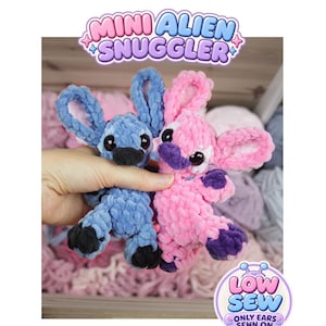 May include: Two plush toys labeled MINI ALIEN SNUGGLER, one blue and one pink, made of soft chenille yarn. Each features large black eyes, long ears, and dark-colored paws. A circular badge indicates LOW SEW ONLY EARS SEWN ON.
