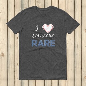 I Love Someone Rare Unisex Shirt - Choose Color