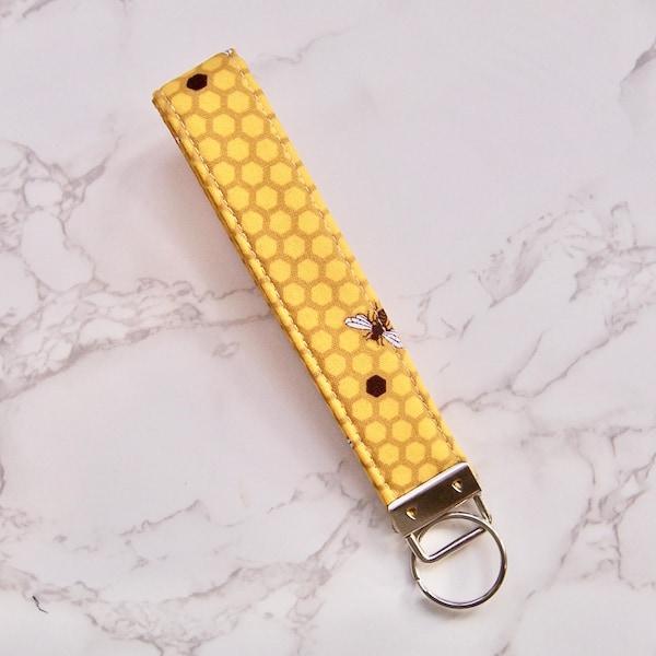 Pretty key fob in a yellow bee fabric , preppy key strap , pretty yellow key strap , lanyard for your keys, love bees and honey