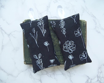 Set of two hanging lavender sachets in a  black and white fabric for your drawers or bathroom sleep aid or small gift travel sachet decor