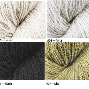 May include: Eight skeins of yarn in different colors, including ecru, lunar, mist, husky, jute, black, kiwi, and harvest.